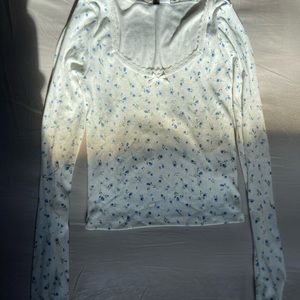 Long sleeve shirt with blue flowers
